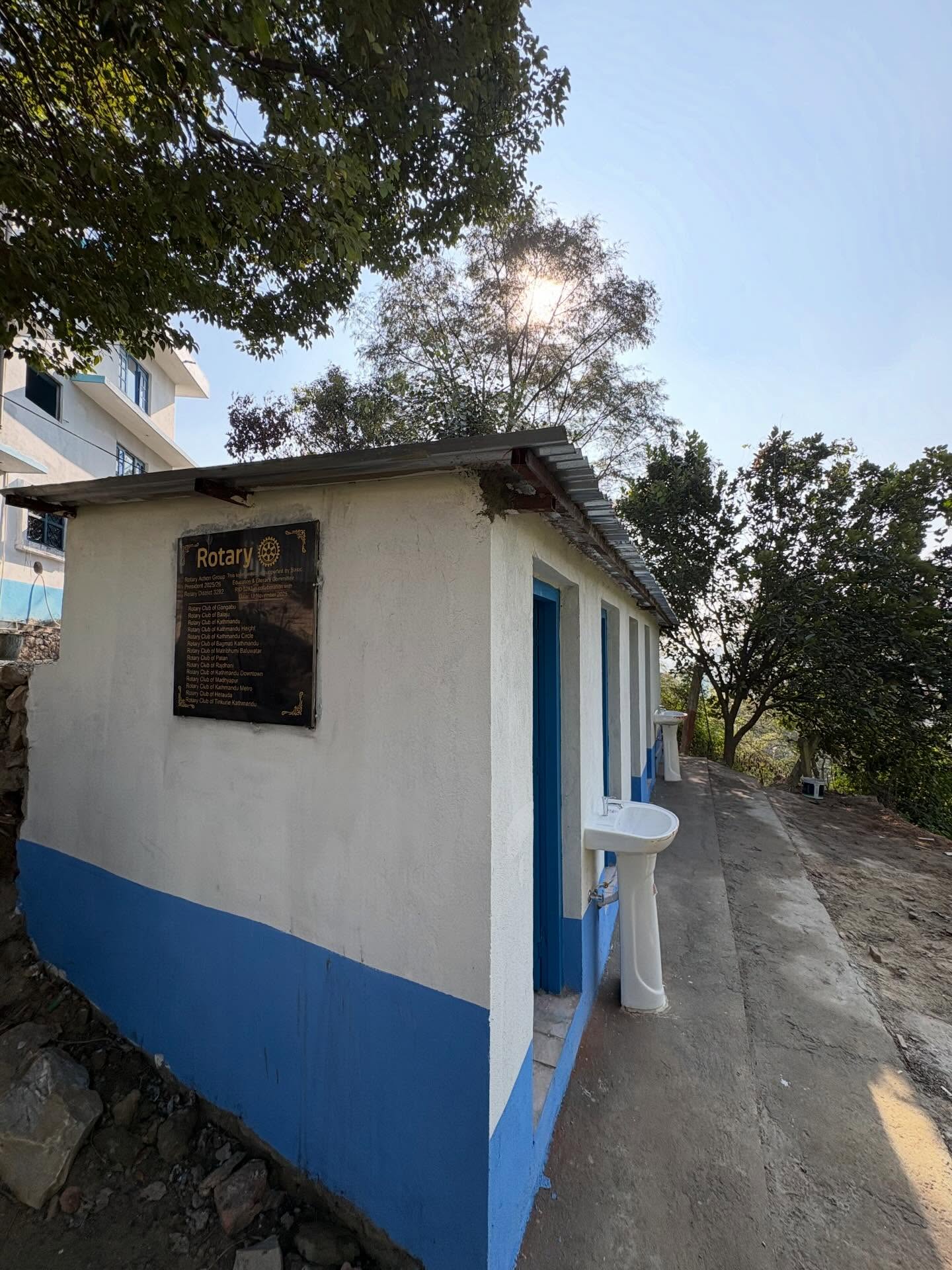 Construction of a toilet building at Dharmasthali Police Post and assistance with computers and printers.