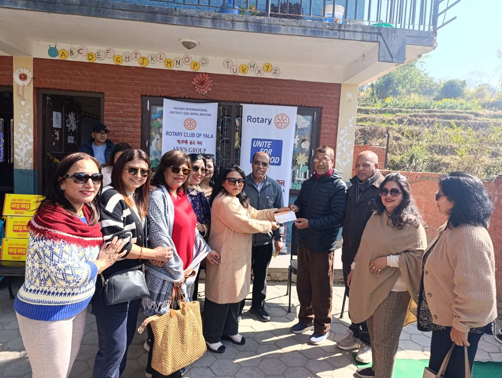 Distribution of Track Suites & Hand over of Cheque for Tiffin